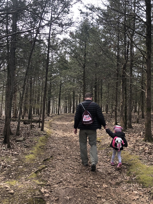 Family hiking Devils Den State Park