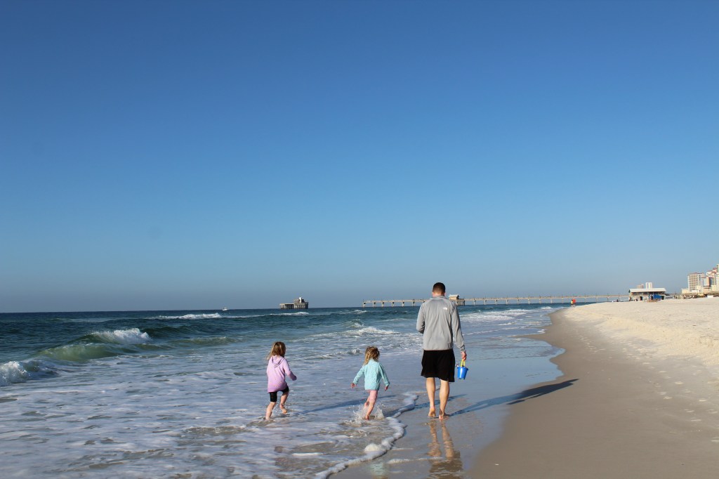looking for seashells Gulf State Park in Gulf Shores, Alabama